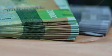 Rupiah Menguat 18 Poin Menjadi Pada Penutupan Sore Ini