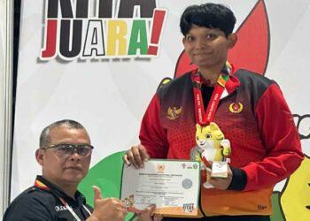 Lalui 4 Laga dalam Sehari, Taekwondoin Delva Rizki Harus Puas dengan Medali Perak PON XXI-2024